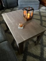 Walnut end table with lantern and coaster