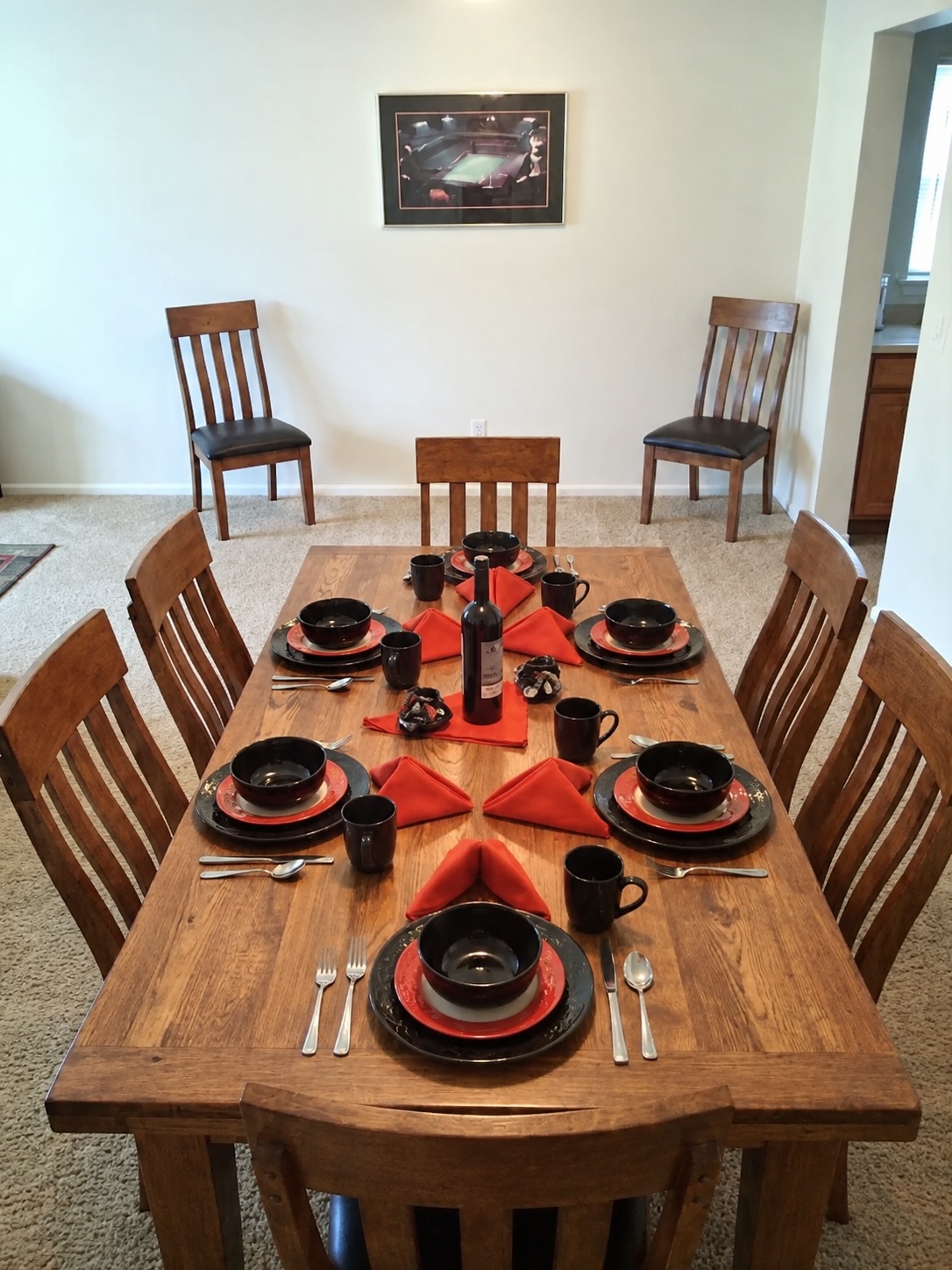 Custom rustic dining table with red accents, handcrafted in Indiana